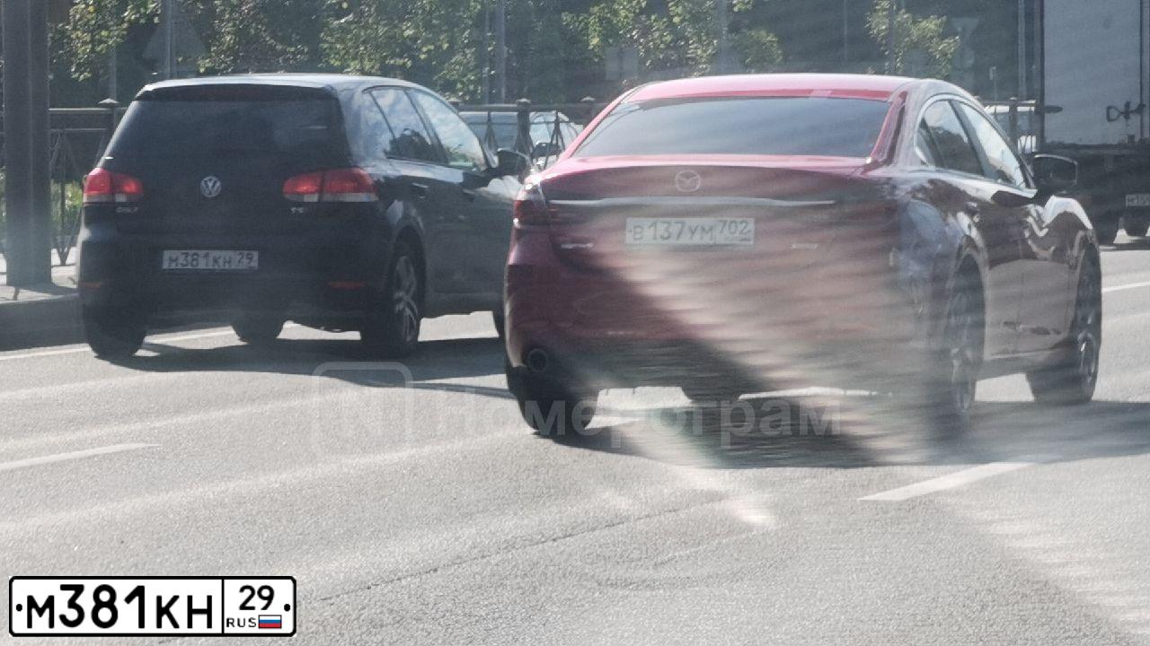 Фото автомобиля VOLKSWAGEN GOLF, 2009 — госномер М381КН29. Цвет: ЧЕРНЫЙ