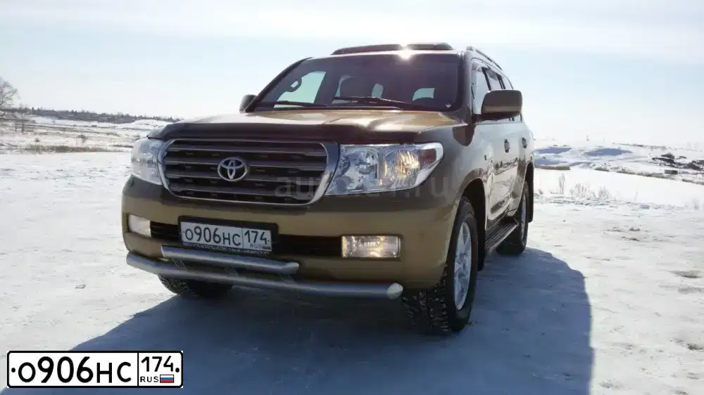 Фото автомобиля TOYOTA LANDCRUISER 200, 2011 — госномер В931МО186. Цвет: ЗОЛОТИСТЫЙ