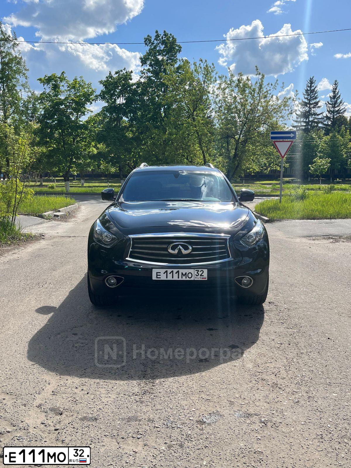 Фото автомобиля FORD FOCUS, 2004 — госномер Е111МО32. Цвет: СЕРО-ЗОЛОТИСТЫЙ