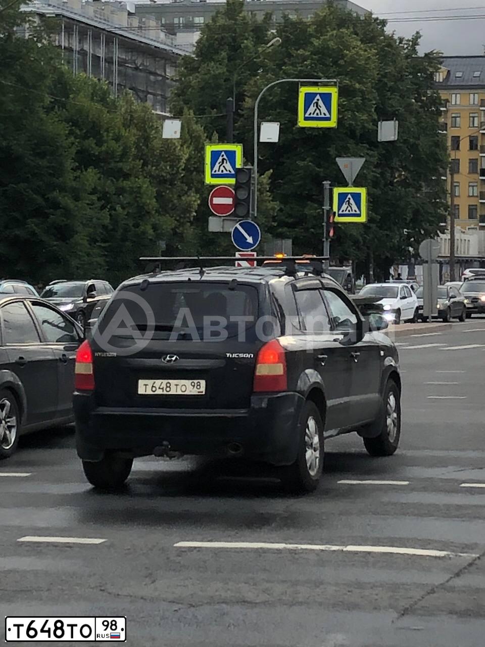 Фото автомобиля HYUNDAI TUCSON, 2008 — госномер Т648ТО98. Цвет: ЧЕРНЫЙ
