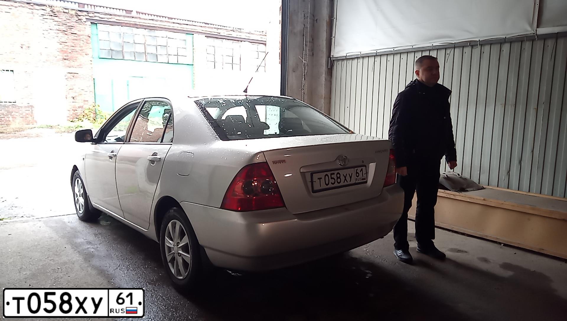 Фото автомобиля TOYOTA COROLLA, 2004 — госномер Т058ХУ61. Цвет: СЕРЫЙ