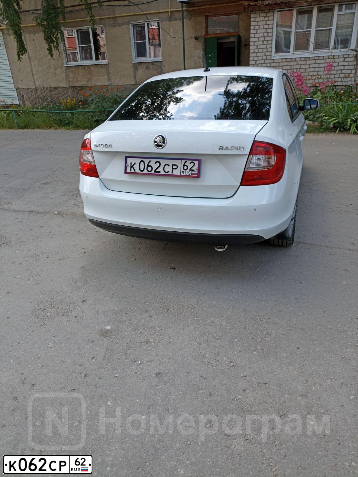 Фото автомобиля SKODA RAPID, 2016 — госномер К062СР62. Цвет: БЕЛЫЙ