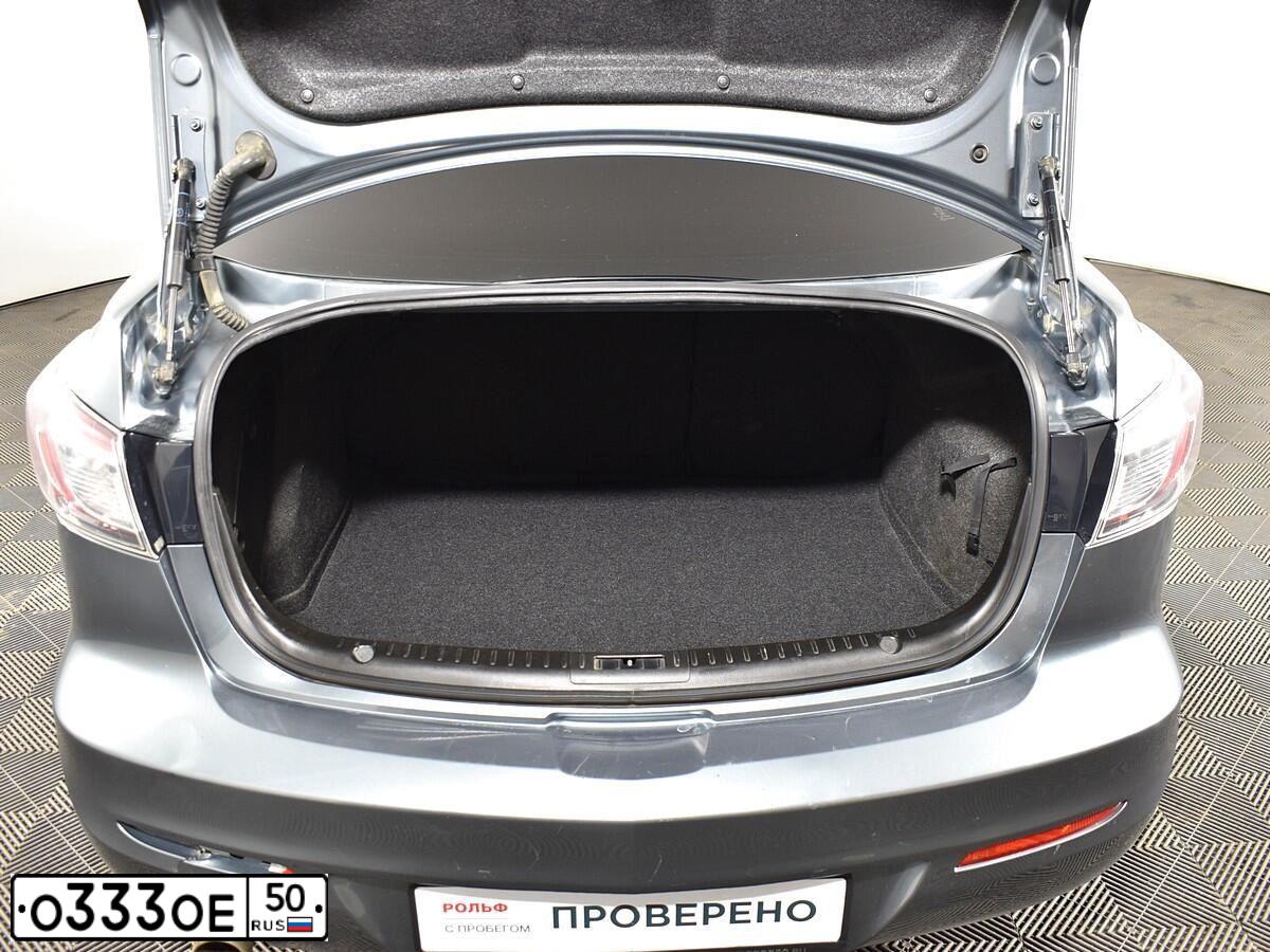 Фото автомобиля MAZDA 3, 2012 — госномер Е124УН702. Цвет: СЕРЫЙ ТЕМНЫЙ