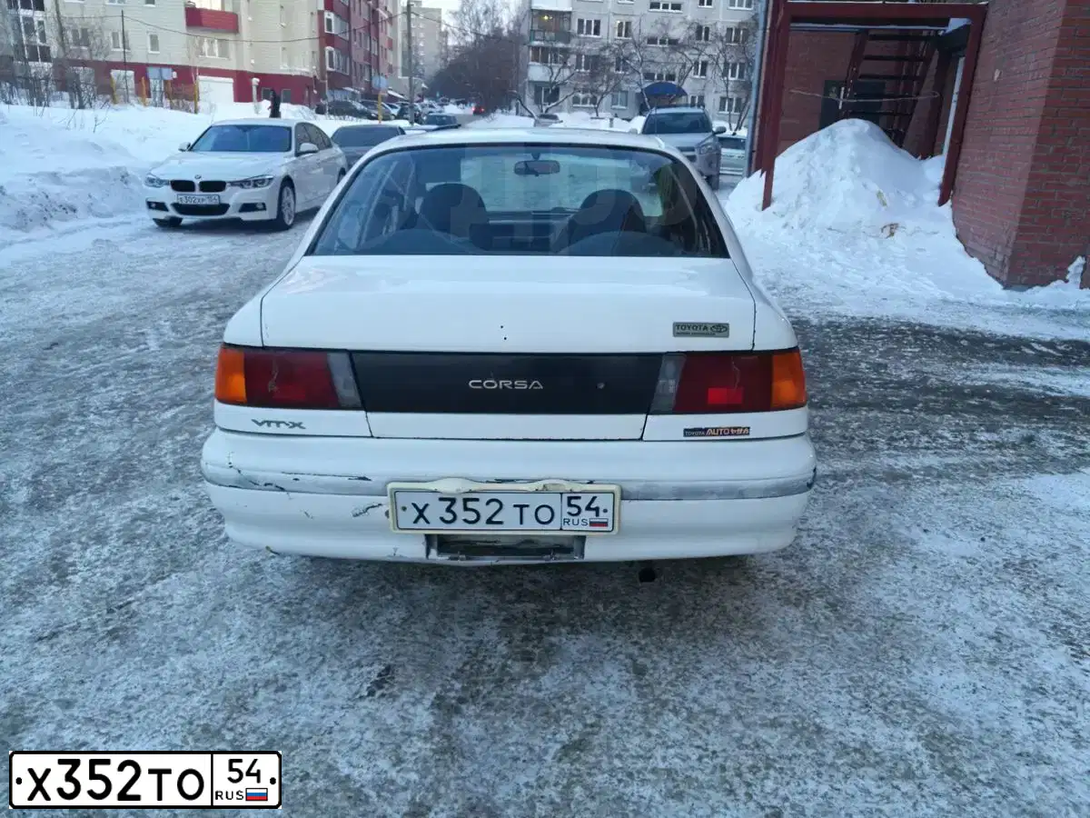 Фото автомобиля TOYOTA CORSA, 1993 — госномер Х352ТО54