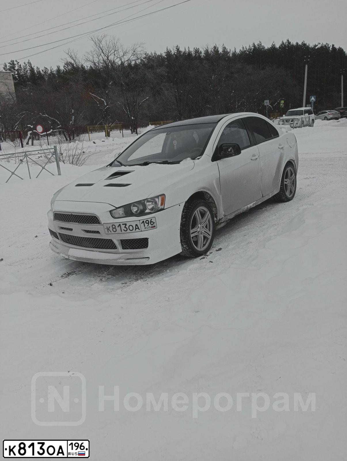 Фото автомобиля MITSUBISHI LANCER, 2007 — госномер М782РЕ702. Цвет: Белый