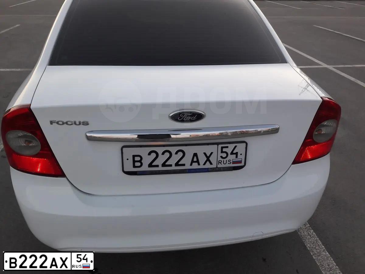 Фото автомобиля FORD FOCUS, 2009 — госномер В222АХ54. Цвет: Белый