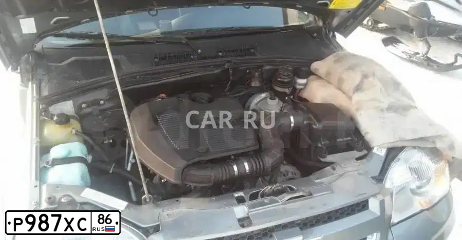 Фото автомобиля CHEVROLET AVEO, 2012 — госномер Р987ХС86. Цвет: ЧЕРНЫЙ