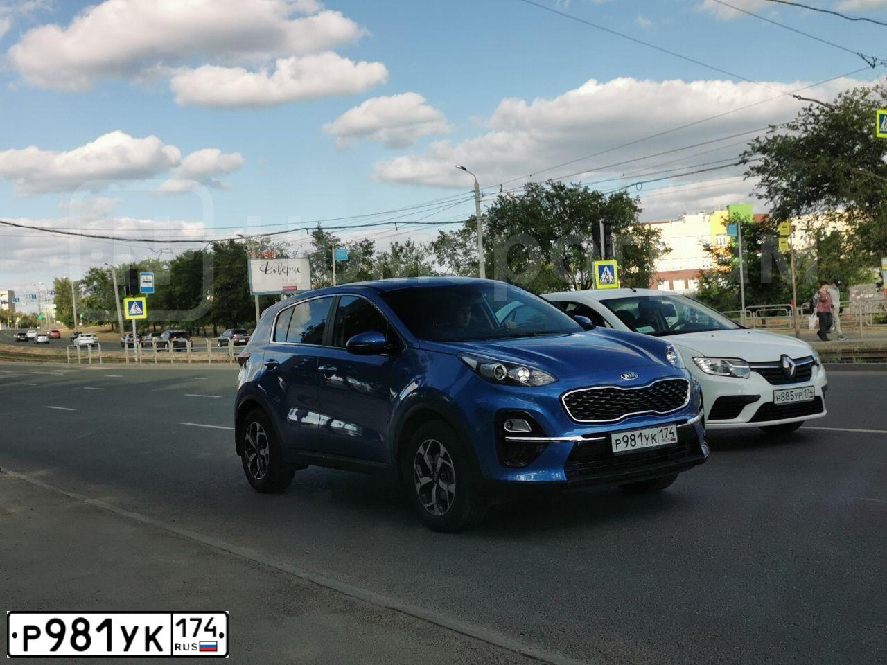 Фото автомобиля KIA SPORTAGE, 2019 — госномер Р981УК174. Цвет: СИНИЙ