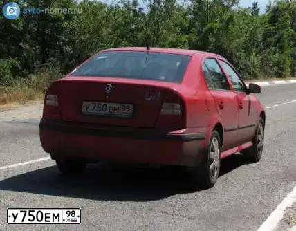 Фото автомобиля SKODA OCTAVIA, 2008 — госномер К802РС178. Цвет: Красный