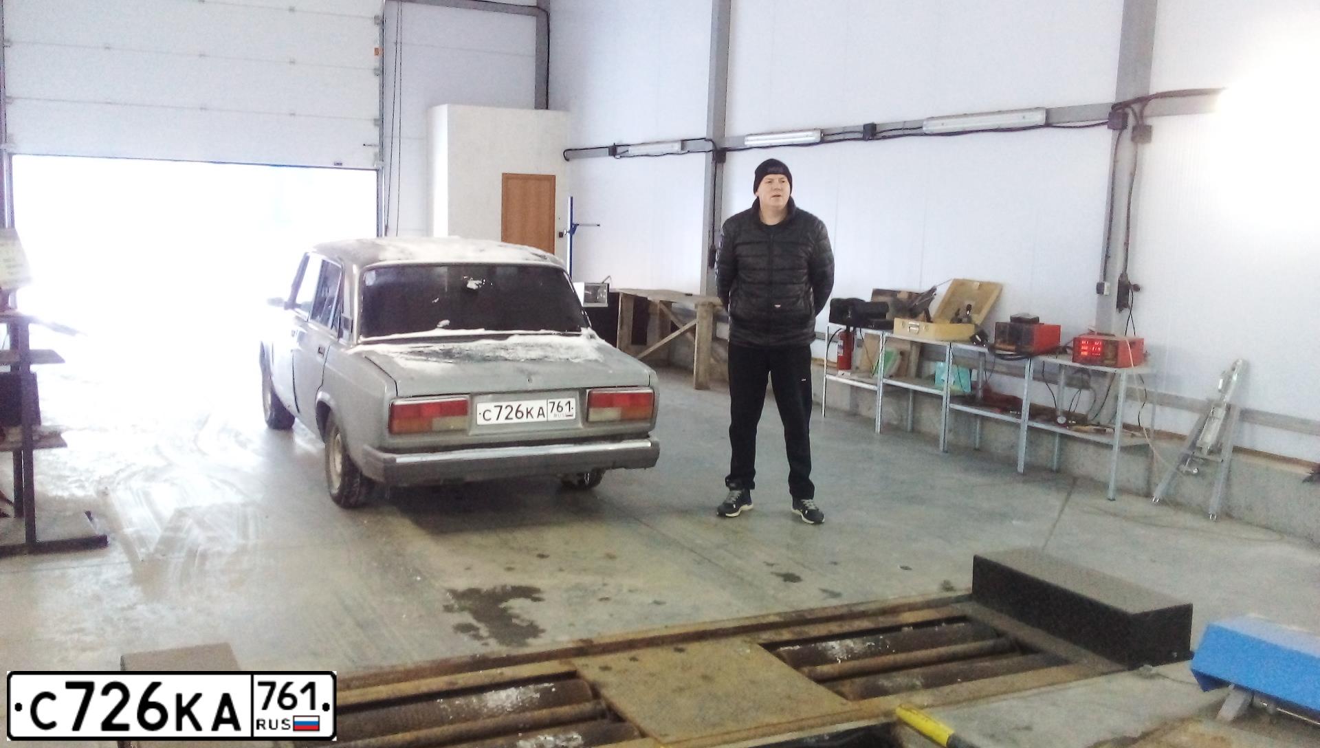 Фото автомобиля LADA 2107, 2010 — госномер Т745МС761. Цвет: СРЕДНИЙ СЕРО-ЗЕЛЕН.МЕТАЛЛ