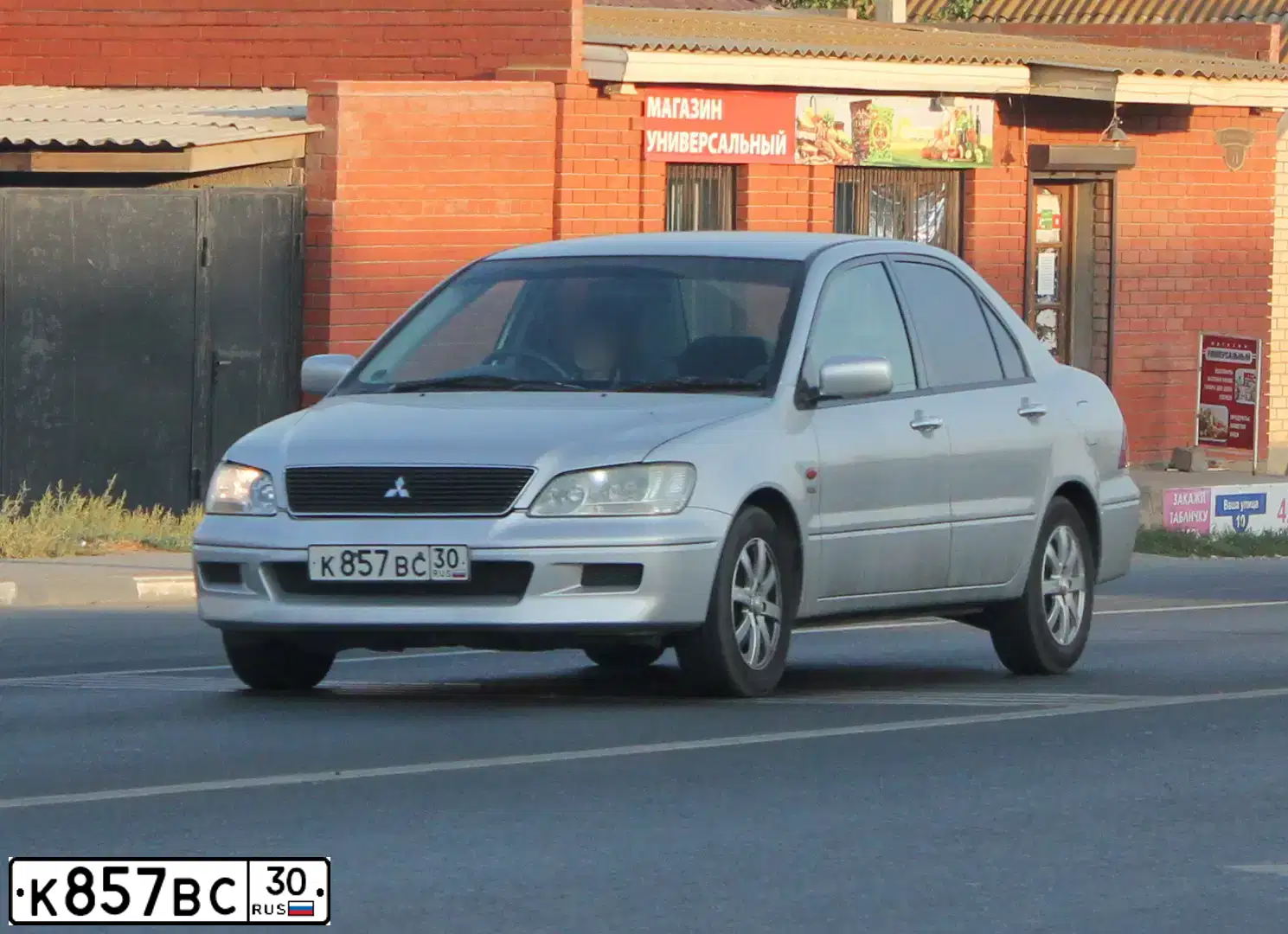 Фото автомобиля MITSUBISHI LANCER CEDIA, 2000 — госномер Н384НО30
