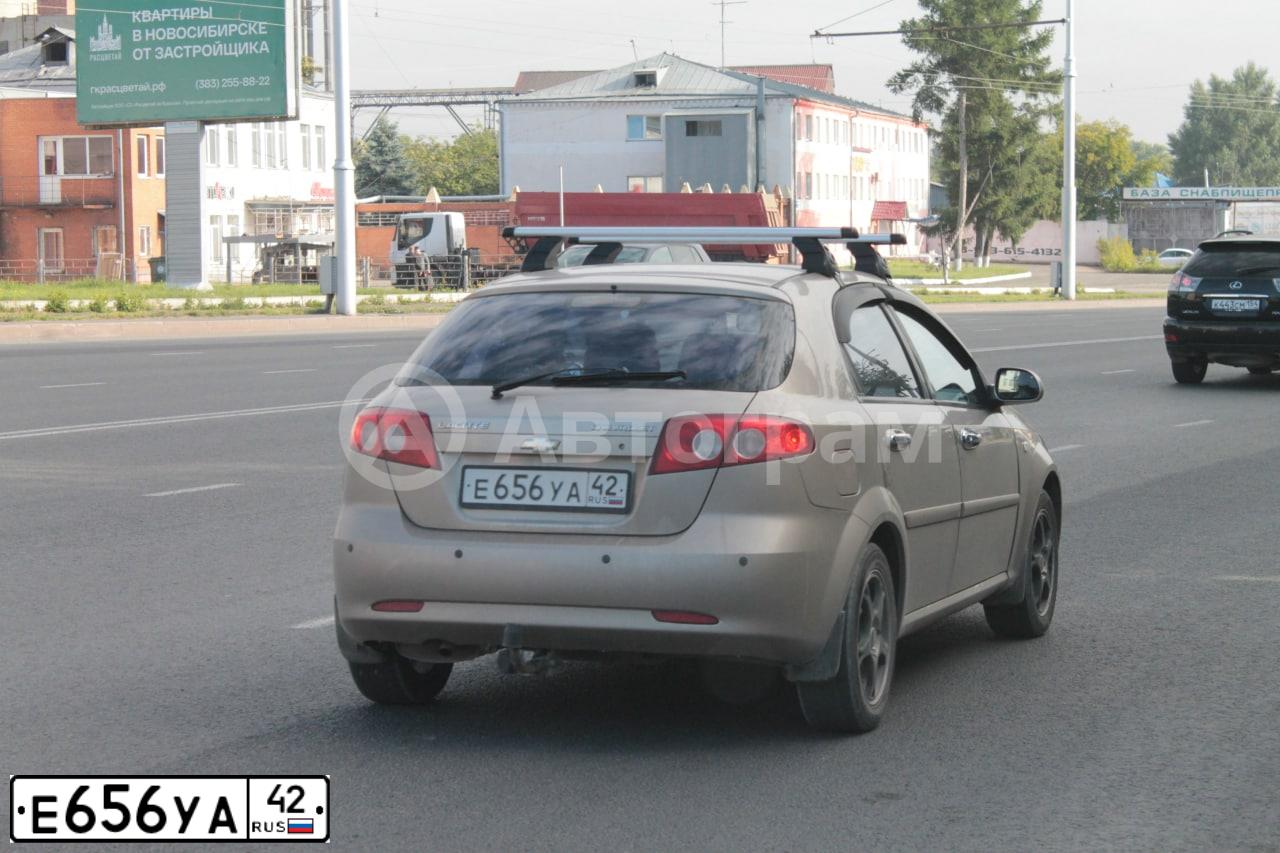 Фото автомобиля LADA 1117 KALINA, 2011 — госномер А755УМ122. Цвет: БЕЛО-ЖЕЛТЫЙ ПЕРЛАМУТРОВЫЙ