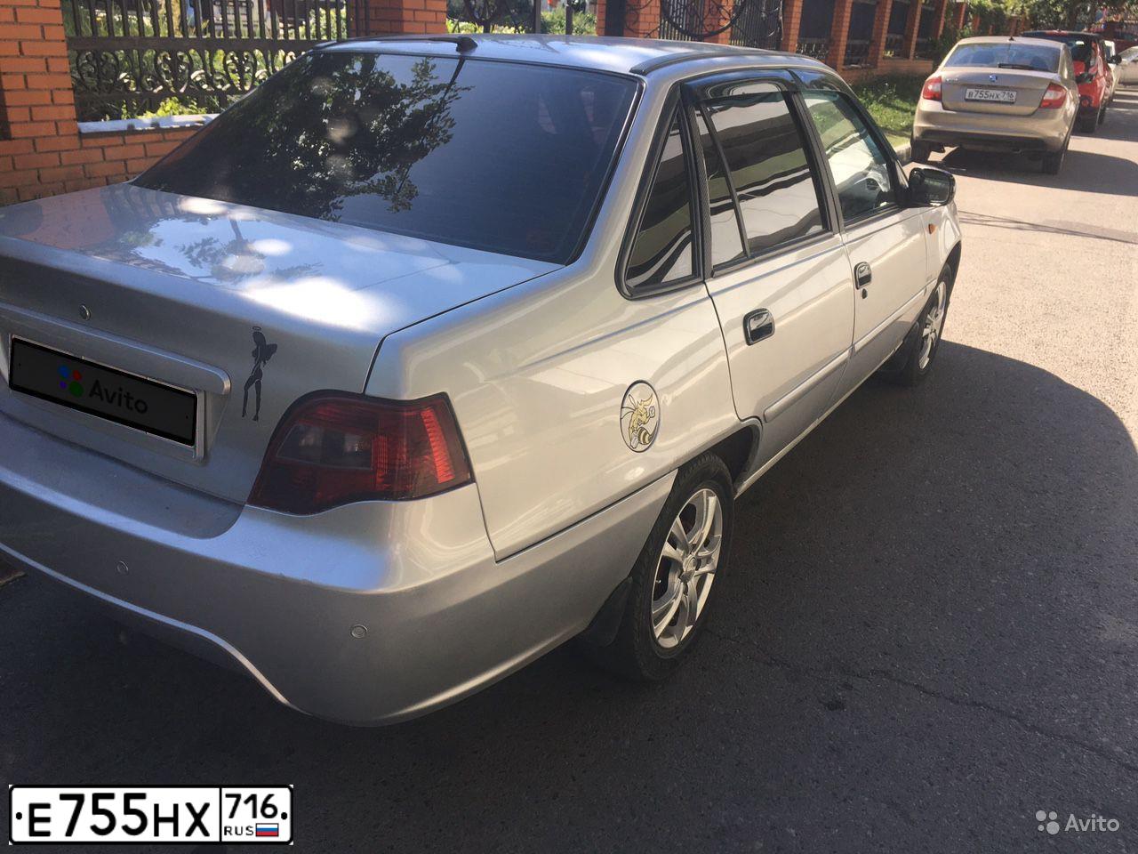 Фото автомобиля KIA RIO, 2013 — госномер Е755НХ716. Цвет: СЕРЫЙ