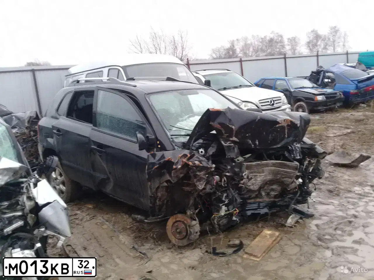 Фото автомобиля HYUNDAI TUCSON, 2008 — госномер М013КВ32. Цвет: ЧЕРНЫЙ