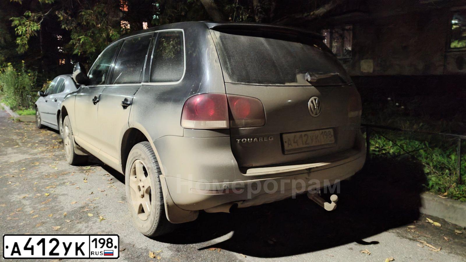 Фото автомобиля VOLKSWAGEN TOUAREG, 2006 — госномер А412УК198. Цвет: ЧЕРНЫЙ