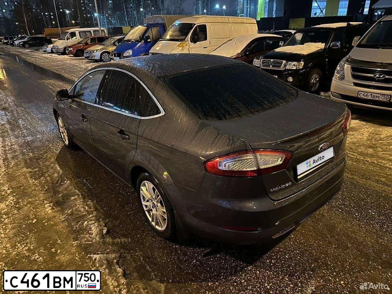 Фото автомобиля HYUNDAI GRAND STAREX, 2009 — госномер С461ВМ750. Цвет: Серый