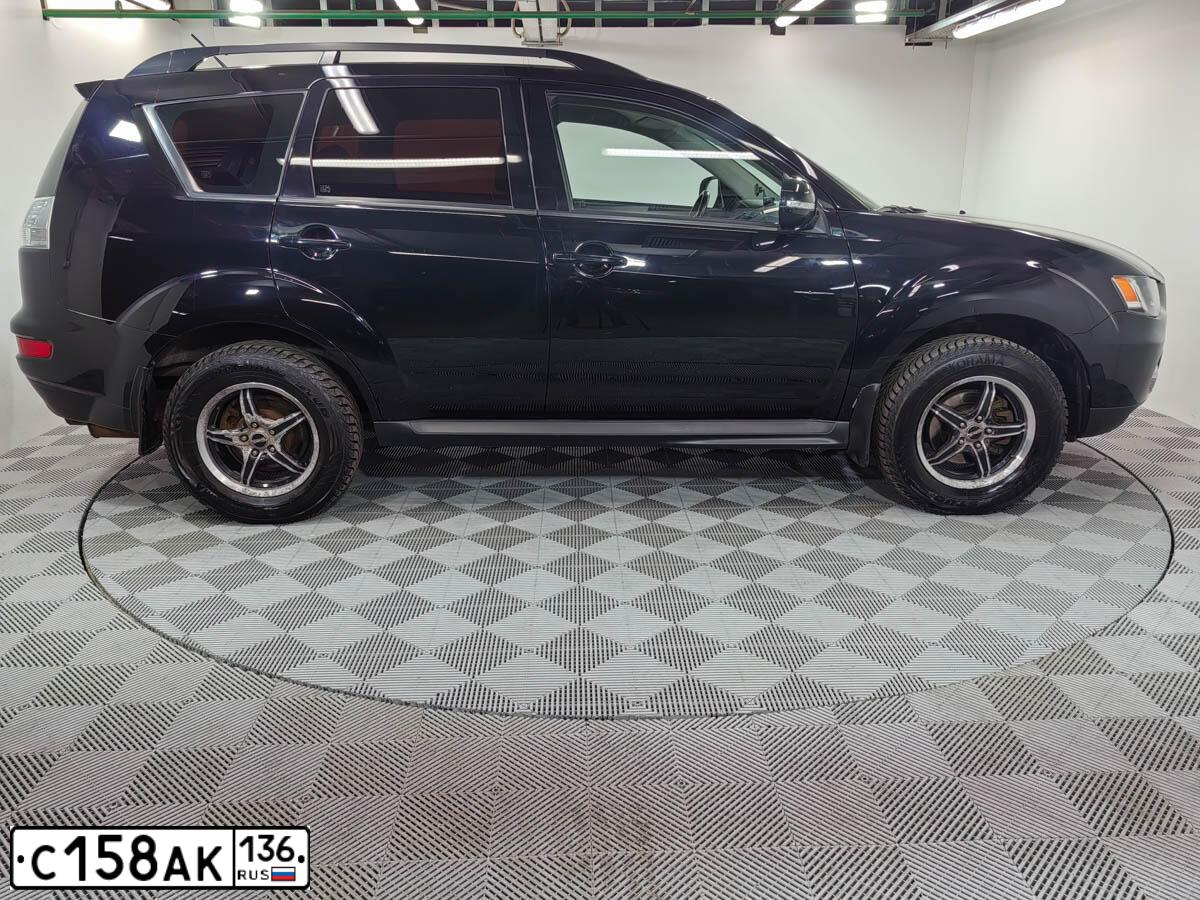 Фото автомобиля MITSUBISHI OUTLANDER, 2011 — госномер Х879ОА797. Цвет: ЧЕРНЫЙ