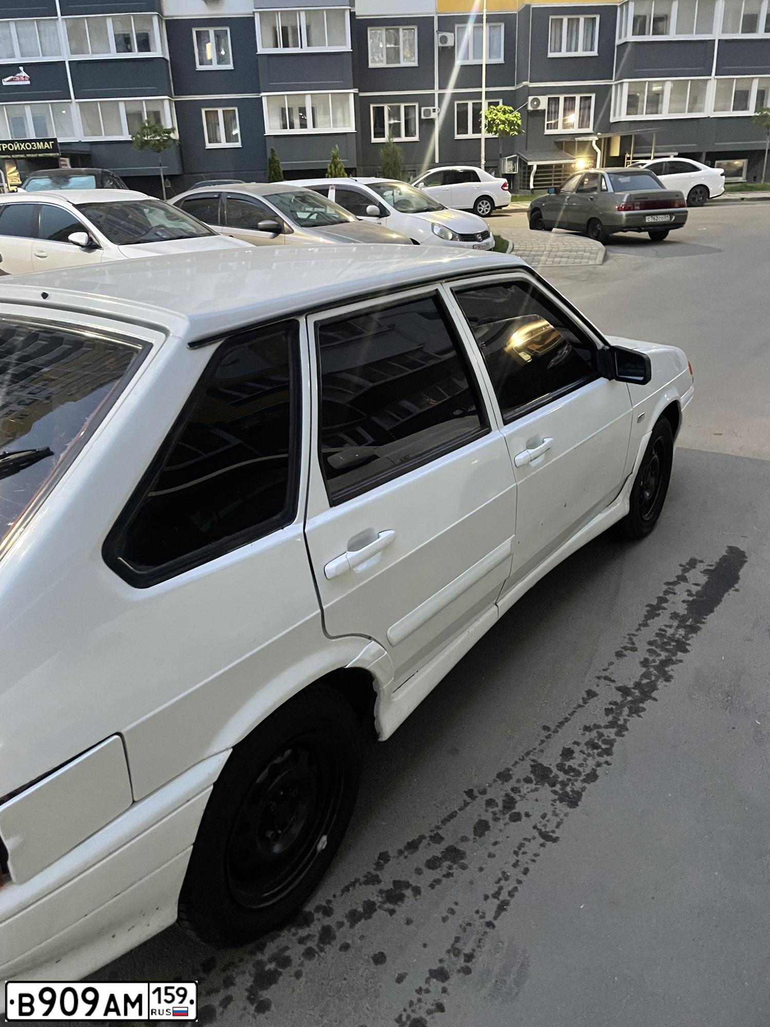 Фото автомобиля ЛАДА 211440 LADA SAMARA, 2012 — госномер Н516УО126. Цвет: Белый