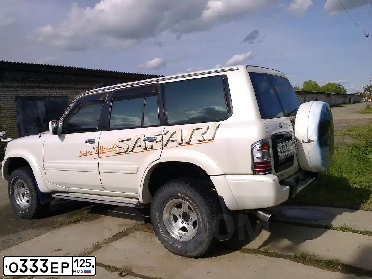 Фото автомобиля TOYOTA LAND CRUISER 200, 2008 — госномер О987РК27. Цвет: ЗОЛОТИСТЫЙ