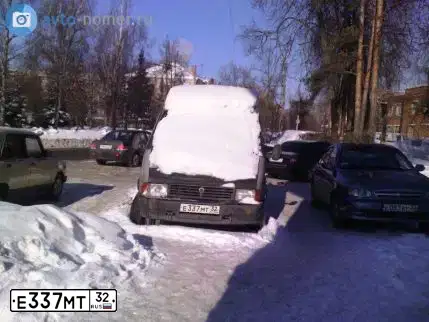 Фото автомобиля GAZ 3302 EL, 1999 — госномер Е337МТ32. Цвет: СЕРЫЙ