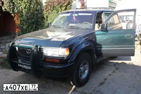 Фото автомобиля VOLKSWAGEN PASSAT, 1997 — госномер С521АА152. Цвет: ВИШНЕВЫЙ