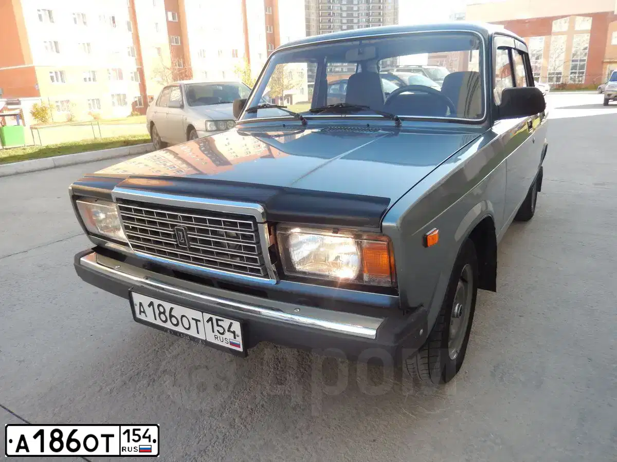 Фото автомобиля LADA 2107 LADA, 2011 — госномер О885КК154. Цвет: средний серо-зеленый металлик