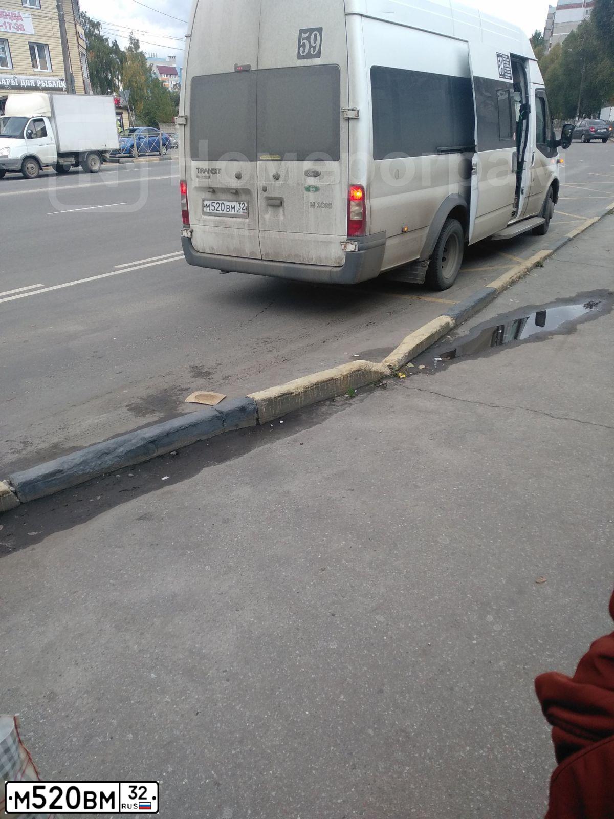 Фото автомобиля FORD TRANSIT, 2010 — госномер О877ХК32. Цвет: Белый