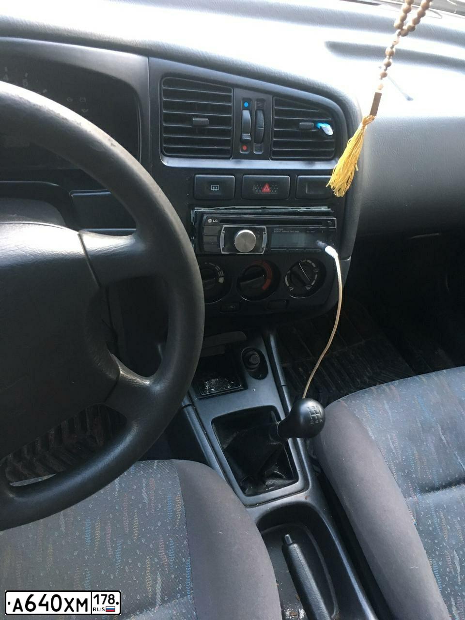 Фото автомобиля NISSAN PRIMERA, 1996 — госномер Е012МК797. Цвет: СЕРЫЙ