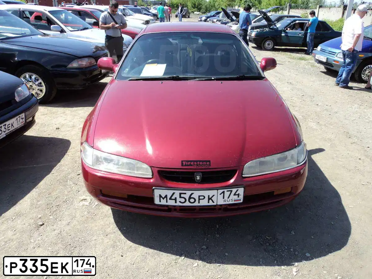 Фото автомобиля KIA SPECTRA, 2008 — госномер Р335ЕК174. Цвет: Серебристый