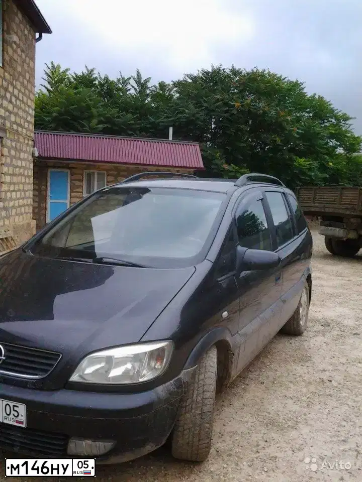 Фото автомобиля OPEL ZAFIRA, 2000 — госномер М146НУ05. Цвет: ЧЕРНЫЙ
