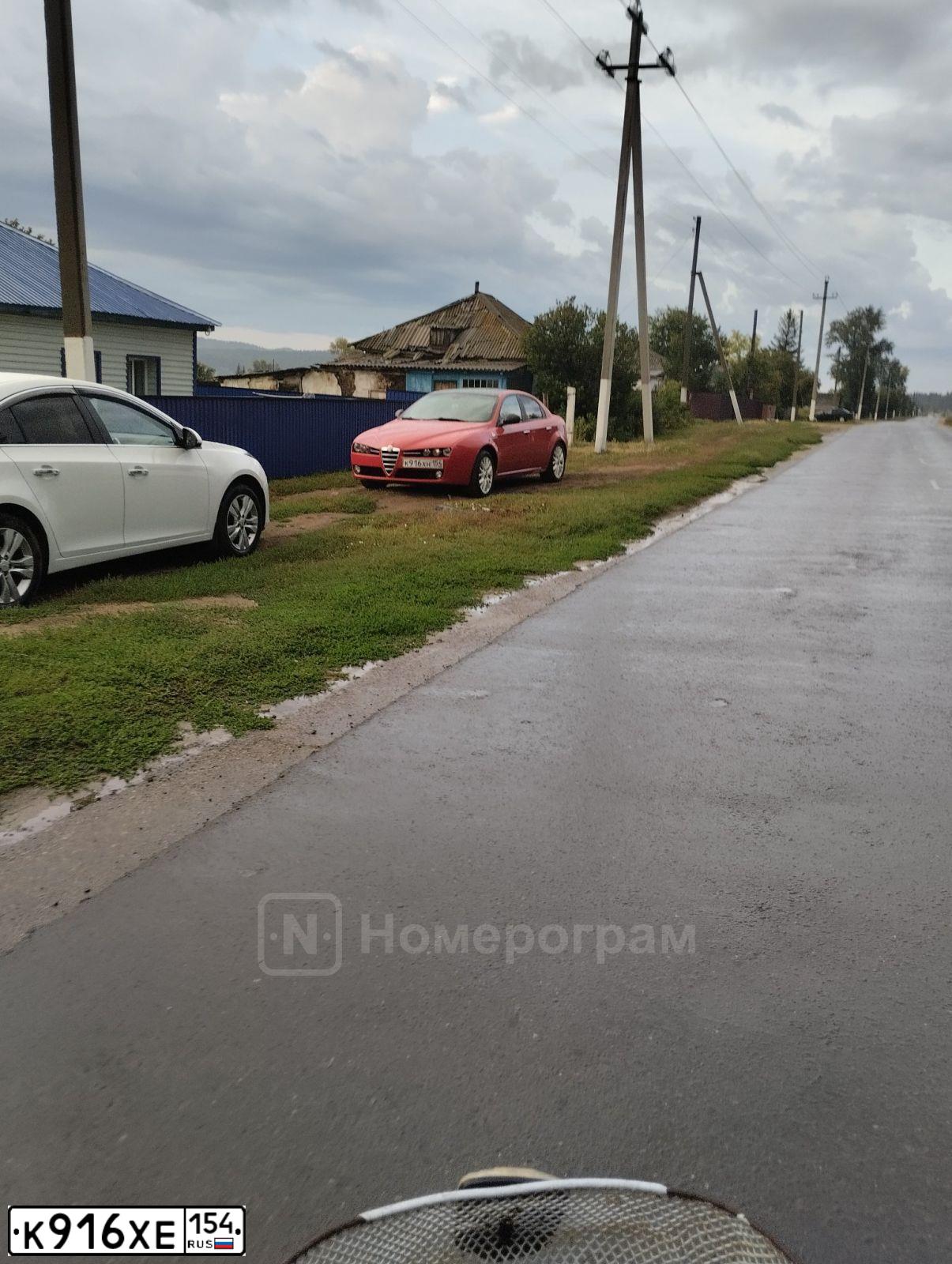 Фото автомобиля RENAULT KOLEOS, 2011 — госномер К916ХЕ154. Цвет: ЧЕРНЫЙ