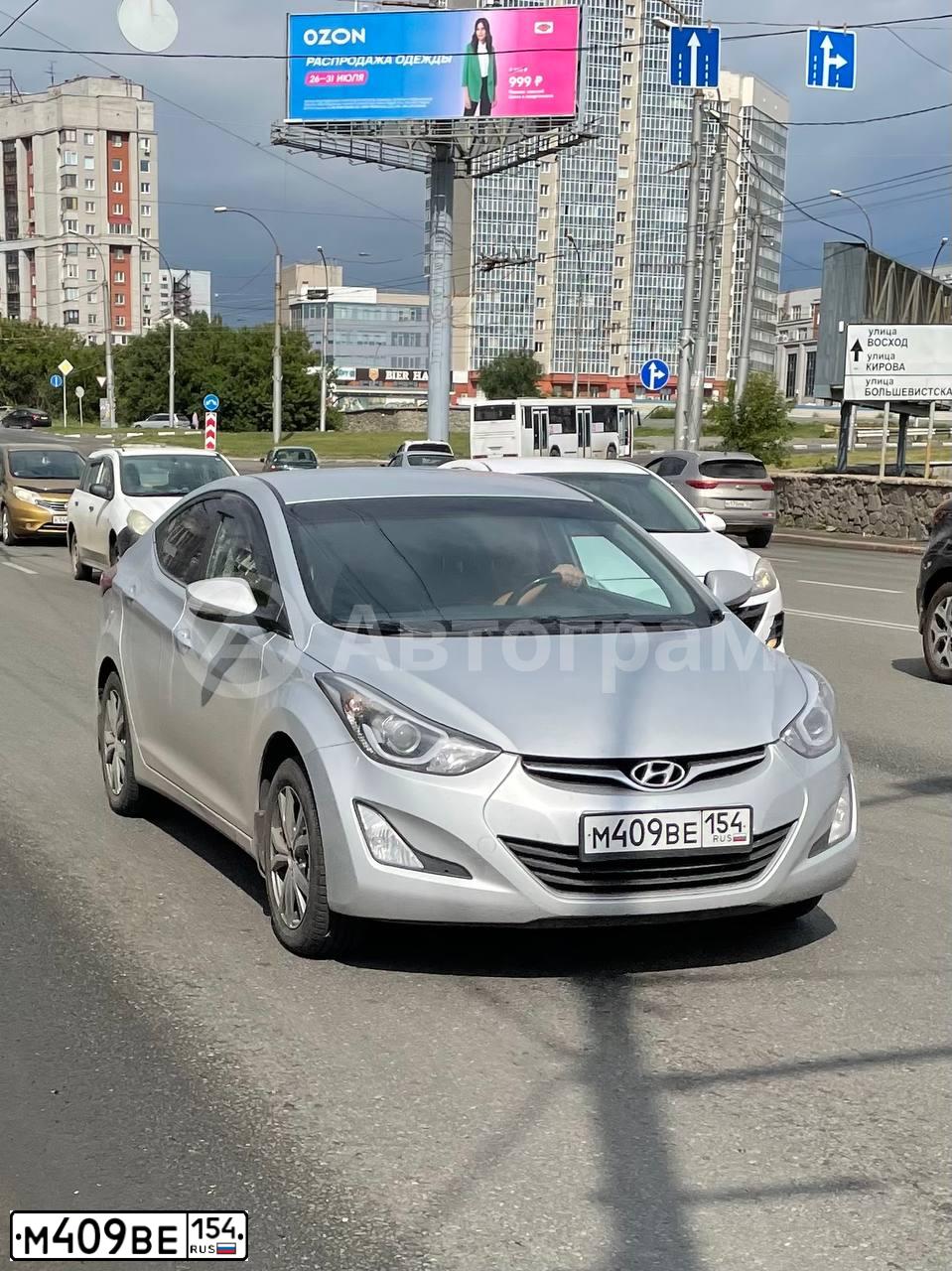 Фото автомобиля HYUNDAI ELANTRA, 2014 — госномер М409ВЕ154. Цвет: СЕРЕБРИСТЫЙ