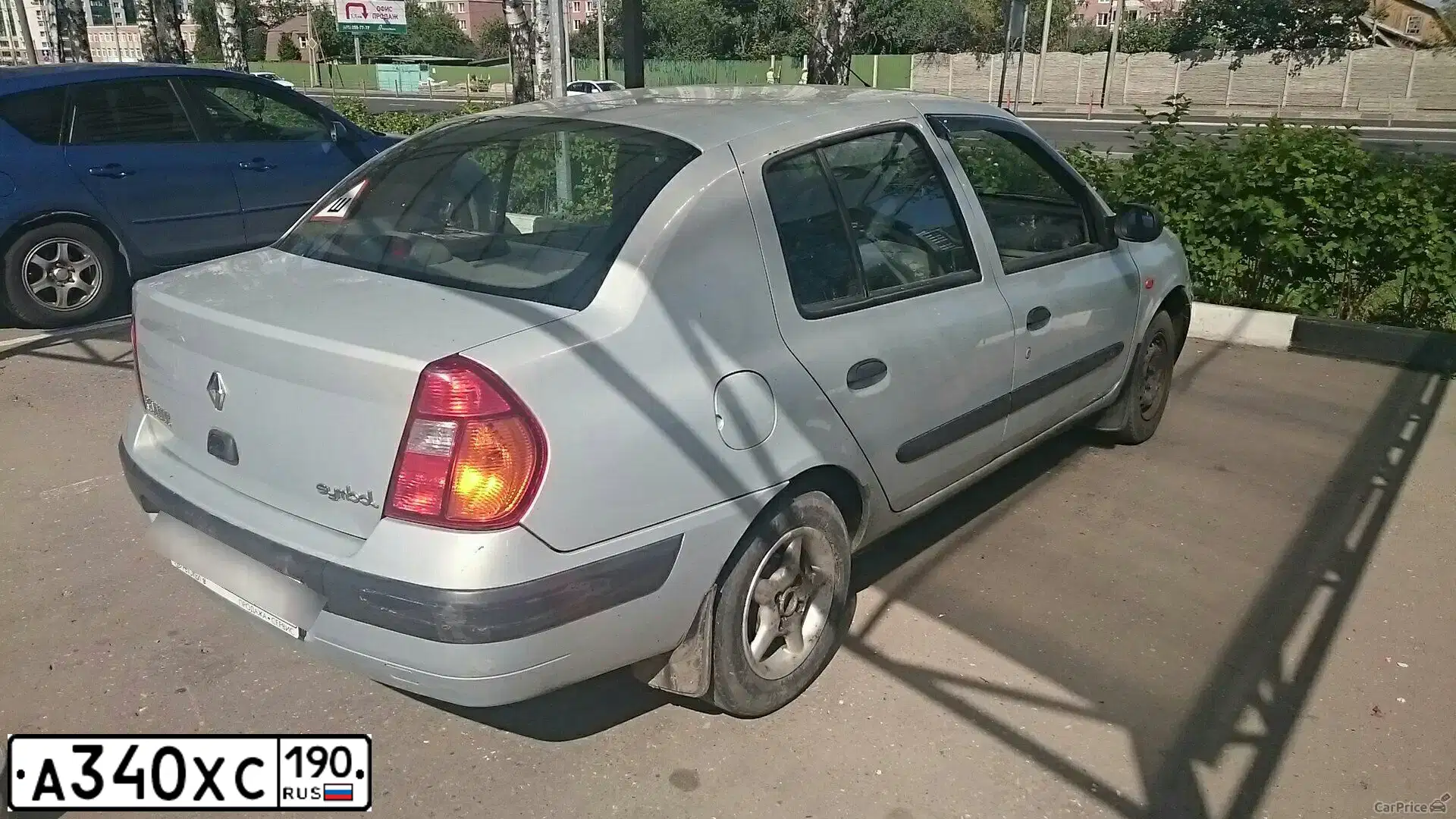 Фото автомобиля RENAULT SYMBOL, 2003 — госномер Е955ЕС136. Цвет: Светло-Серо-Голубой