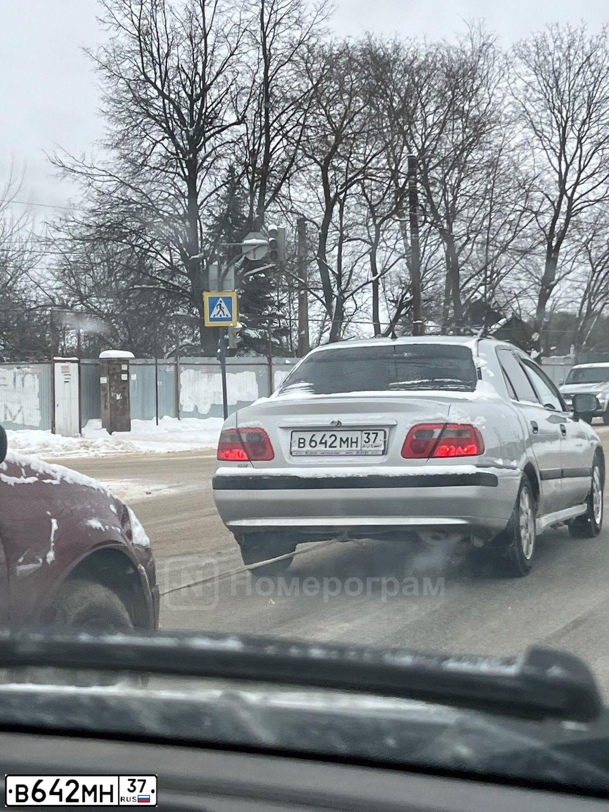 Фото автомобиля MITSUBISHI CARISMA, 2003 — госномер В642МН37. Цвет: СЕРЕБРИСТЫЙ