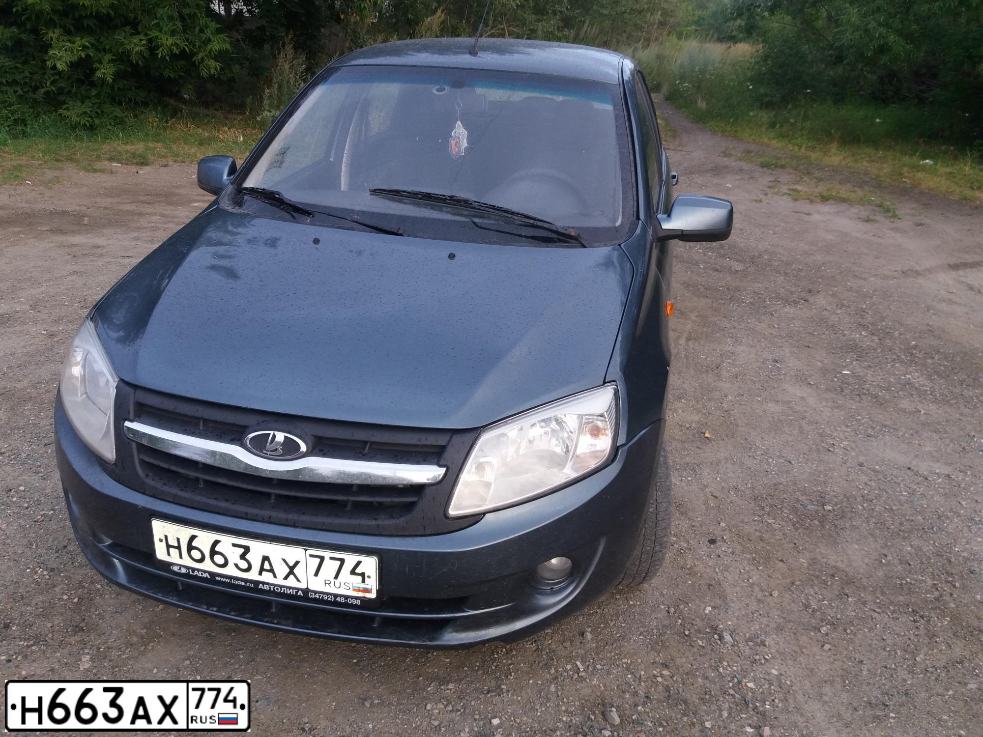 Фото автомобиля LADA 2190 GRANTA, 2013 — госномер Н663АХ774. Цвет: СЕРО-СИНИЙ