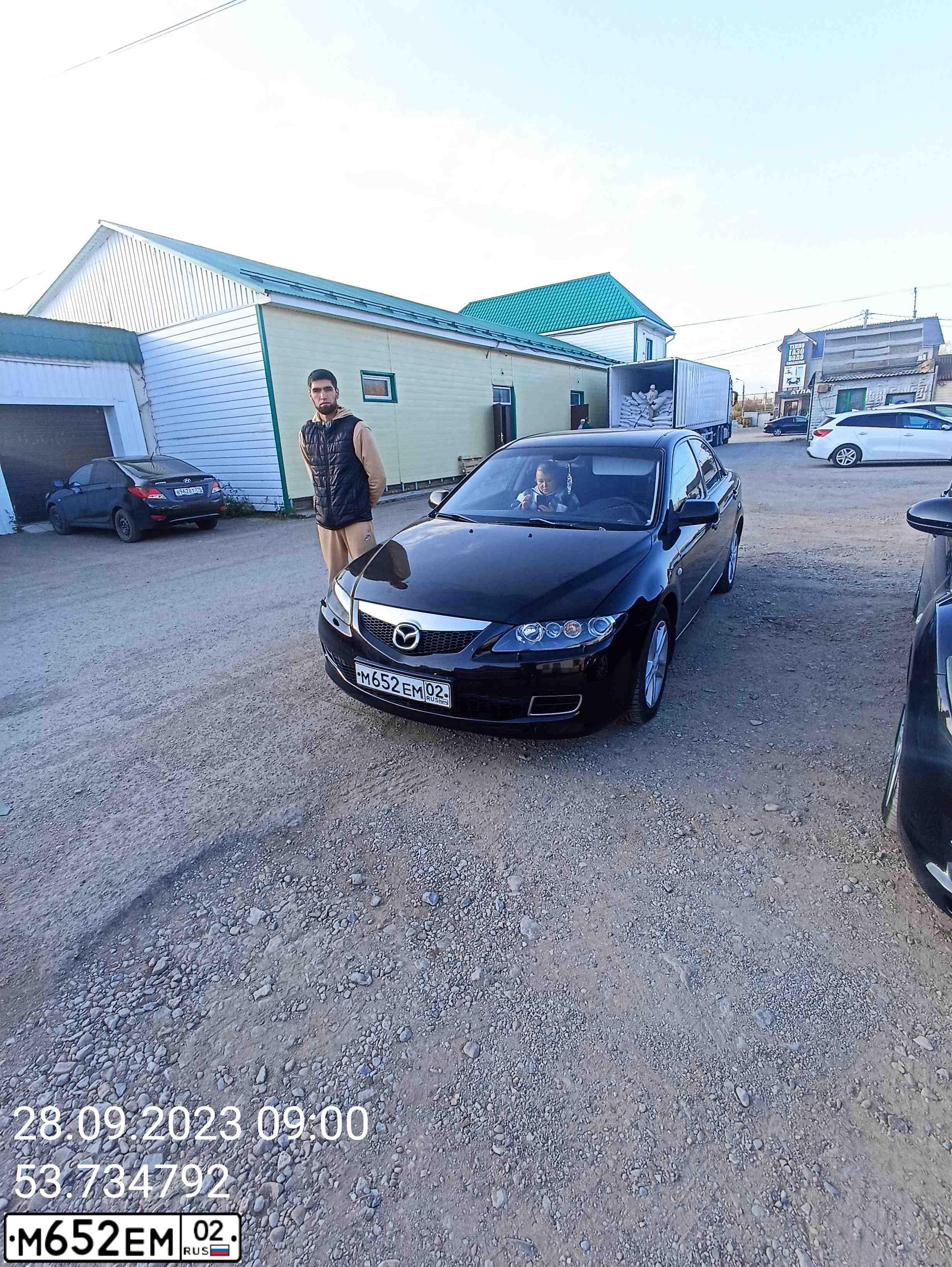 Фото автомобиля MAZDA 6, 2006 — госномер М652ЕМ02. Цвет: ЧЕРНО-КРАСНЫЙ