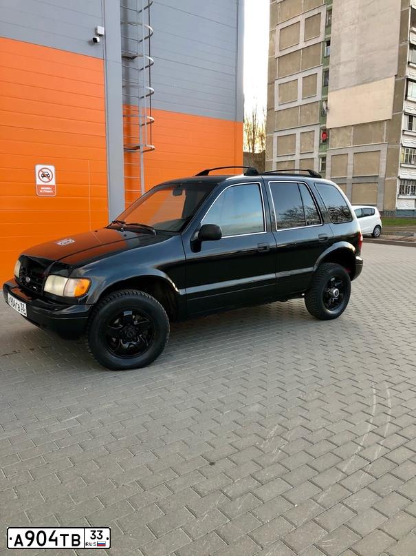 Фото автомобиля KIA SPORTAGE, 2001 — госномер А305КР33. Цвет: ЧЕРНЫЙ