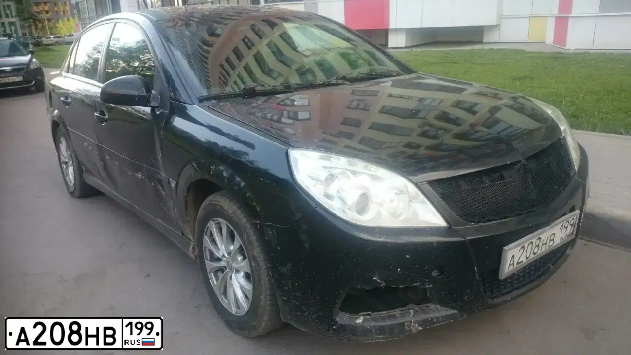 Фото автомобиля OPEL VECTRA, 2008 — госномер А208НВ199. Цвет: ЧЕРНЫЙ