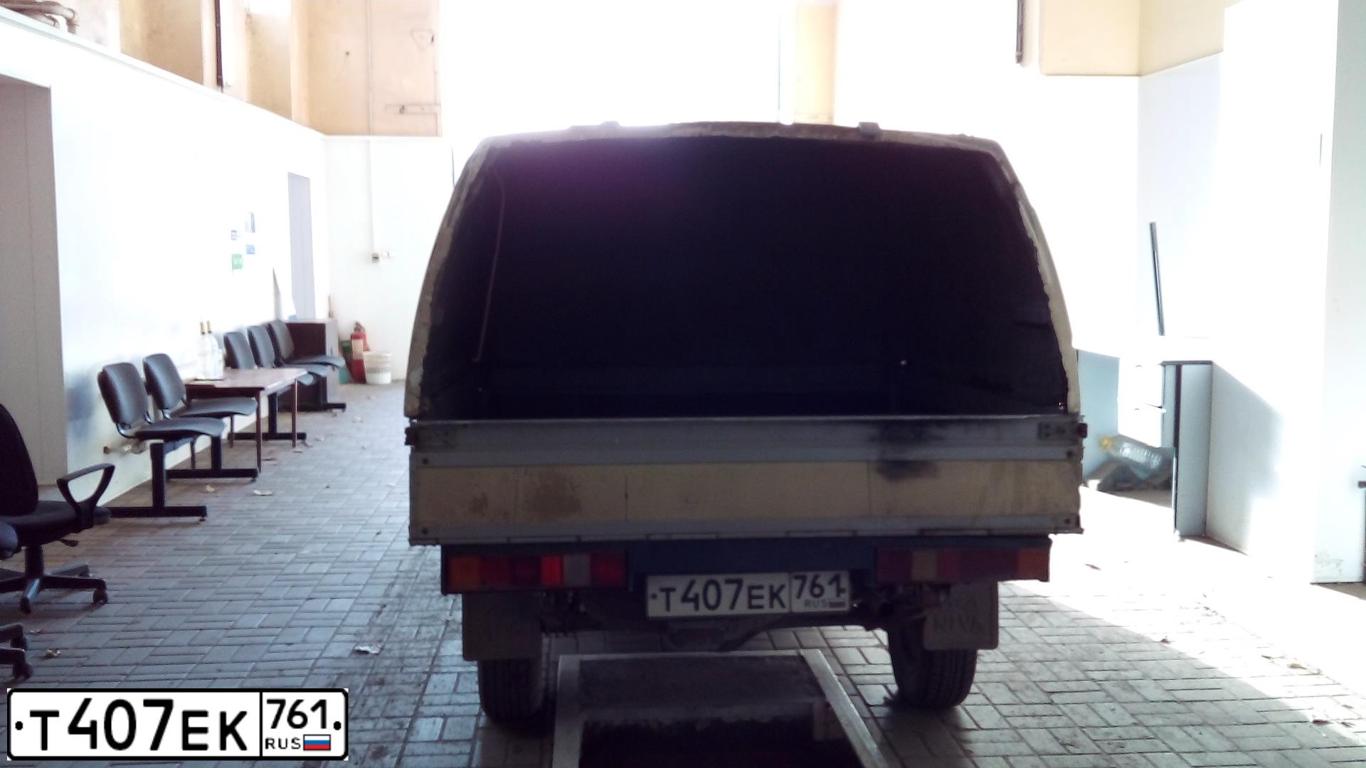 Фото автомобиля LADA 2345 WIS, 2005 — госномер В123МН161. Цвет: сине-зеленый