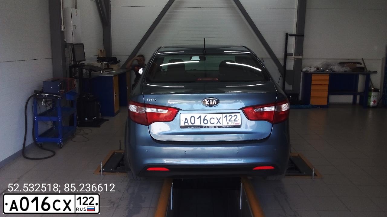 Фото автомобиля KIA RIO, 2011 — госномер В216ТХ124. Цвет: голубой