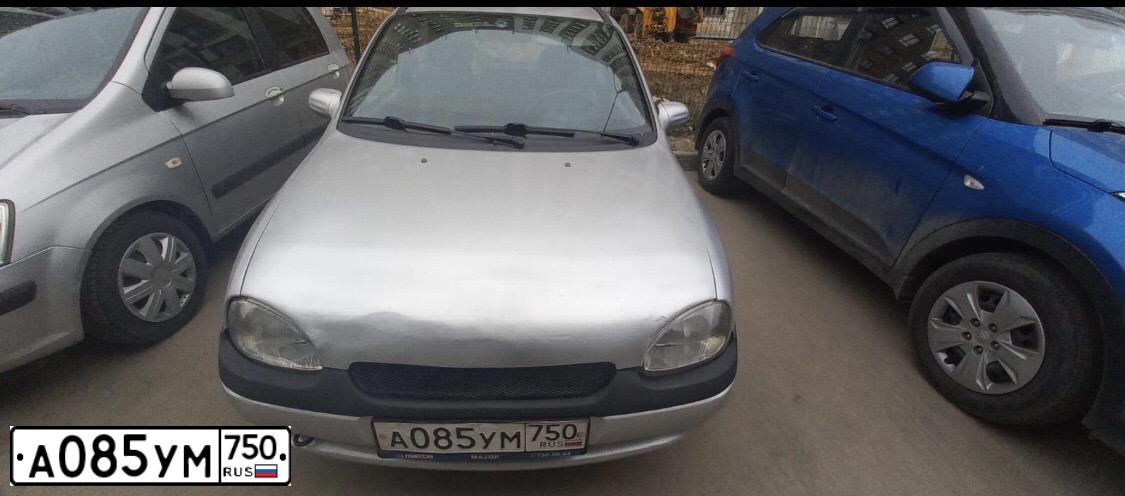 Фото автомобиля OPEL CORSA, 1998 — госномер Н929ВВ977. Цвет: Серебристый