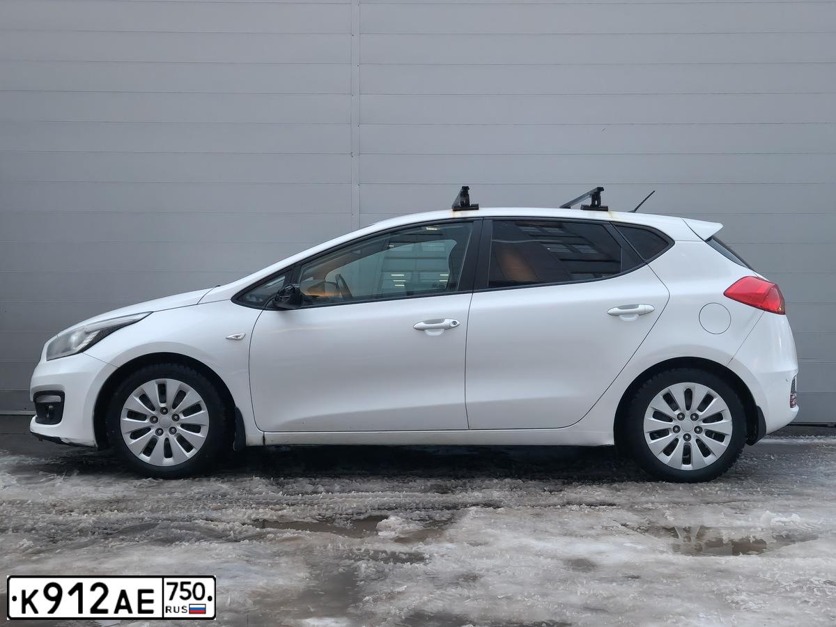 Фото автомобиля KIA CEE'D, 2015 — госномер К912АЕ750. Цвет: БЕЛЫЙ