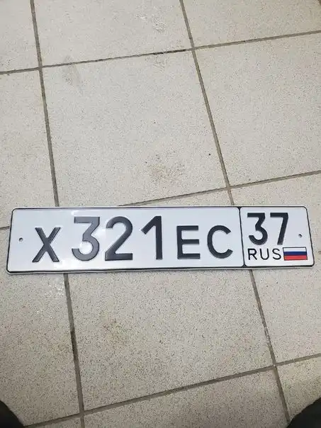 Фото автомобиля SKODA FABIA, 2011 — госномер Т653ВХ774. Цвет: Белый
