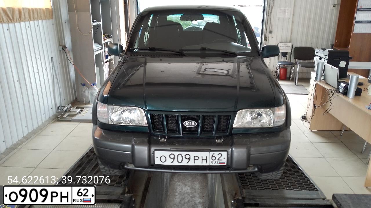 Фото автомобиля KIA SPORTAGE, 2005 — госномер О909РН62. Цвет: ЗЕЛЕНЫЙ