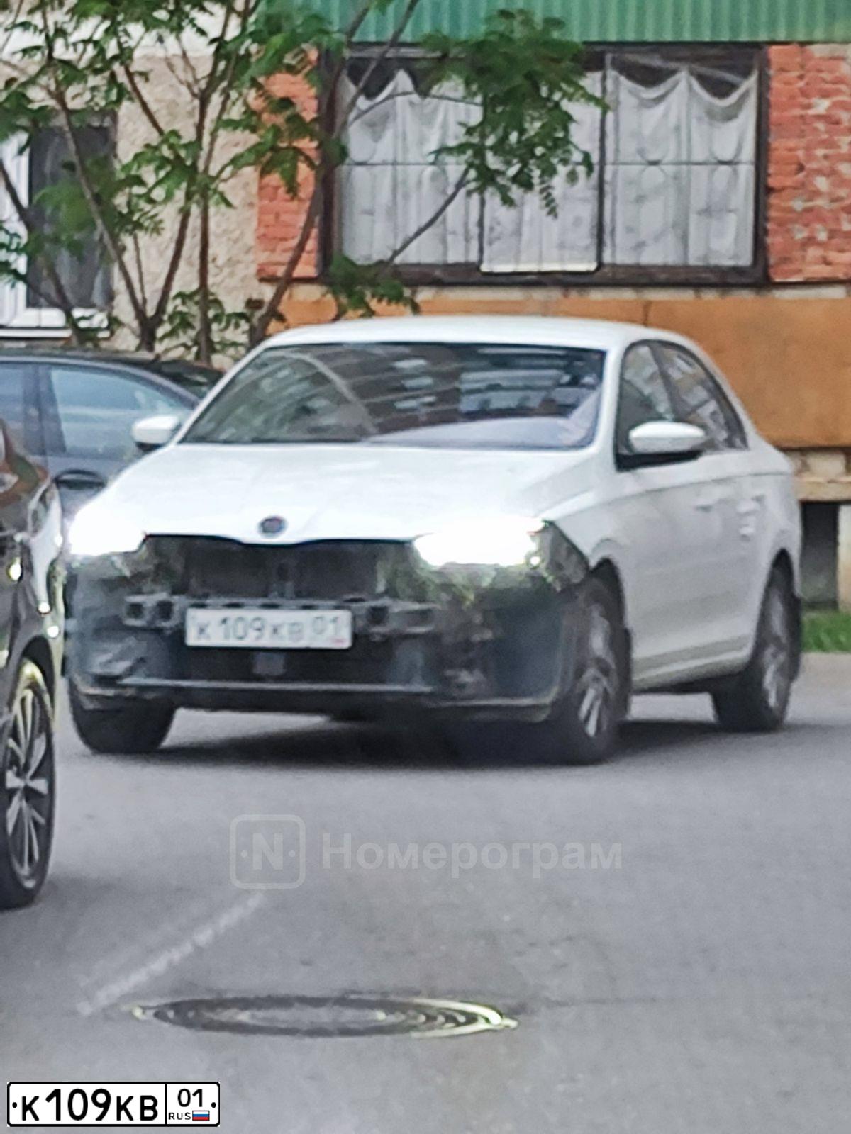 Фото автомобиля SKODA RAPID, 2020 — госномер К109КВ01. Цвет: Белый
