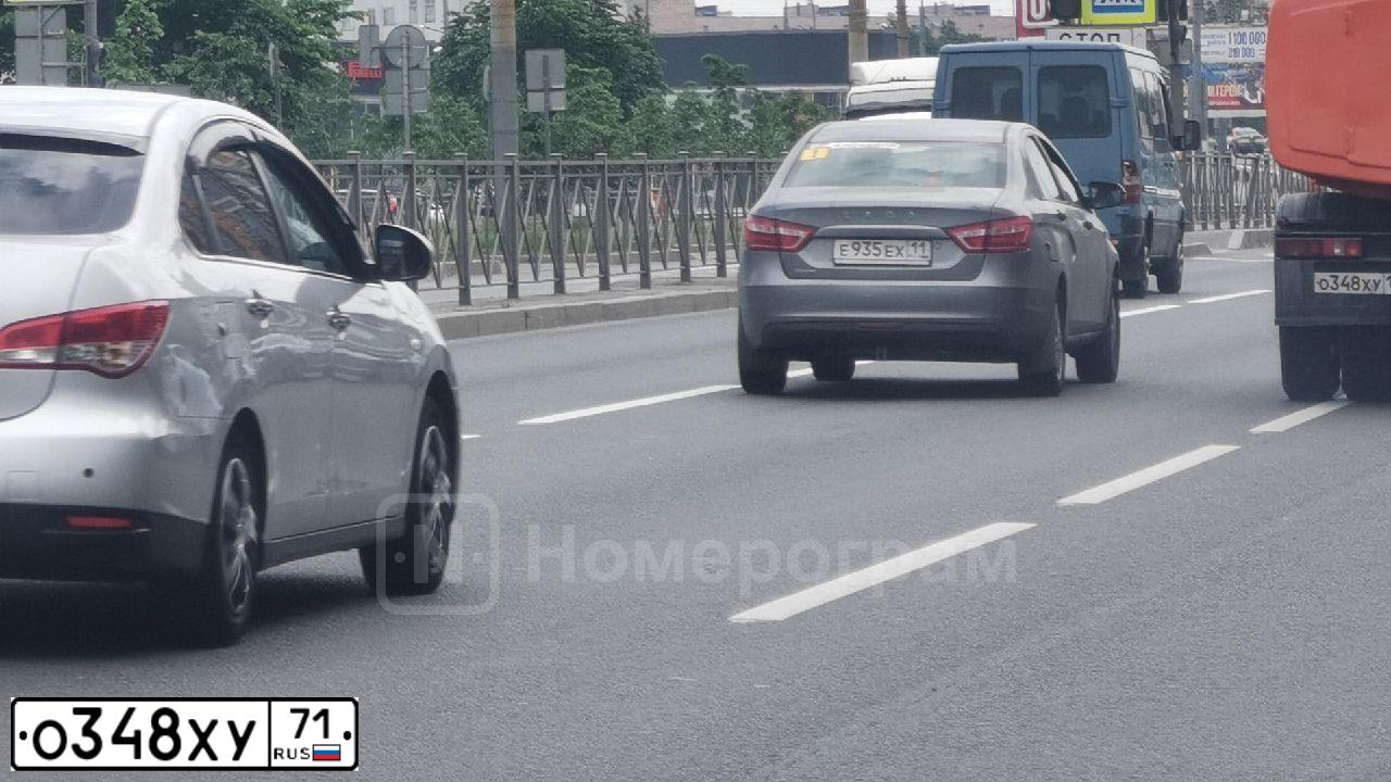 Фото автомобиля MITSUBISHI LANCER, 2007 — госномер О348ХУ71. Цвет: КРАСНЫЙ