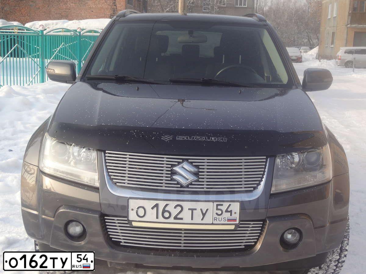 Фото автомобиля SUZUKI /GRAND/ VITARA, 2008 — госномер О162ТУ154. Цвет: СЕРЫЙ