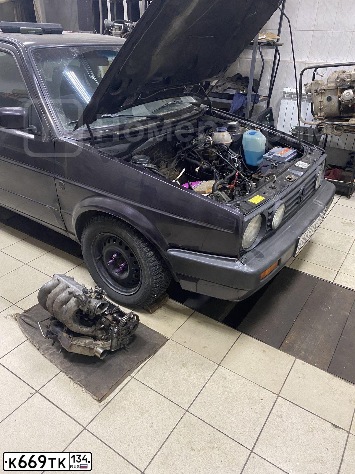 Фото автомобиля VOLKSWAGEN GOLF, 1991 — госномер К669ТК134. Цвет: ФИОЛЕТОВЫЙ