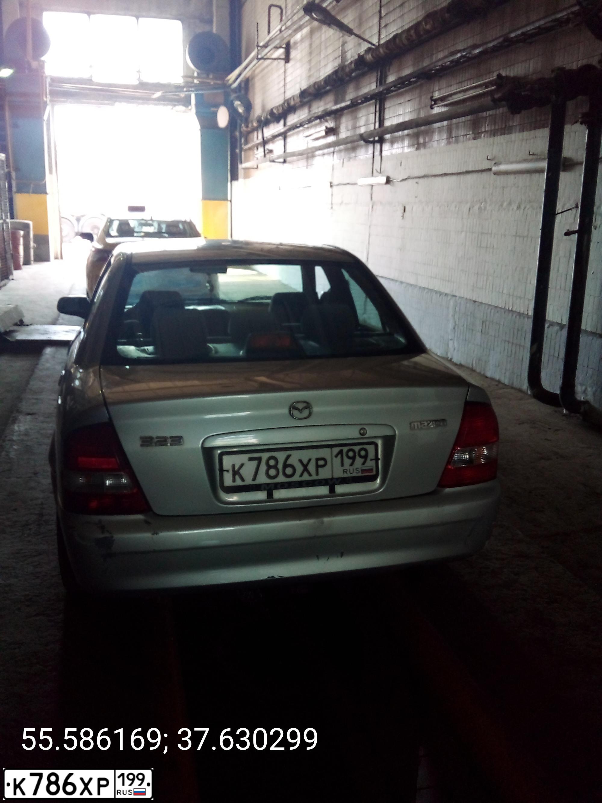 Фото автомобиля MAZDA 323, 1999 — госномер К786ХР199. Цвет: СЕРЕБРИСТЫЙ
