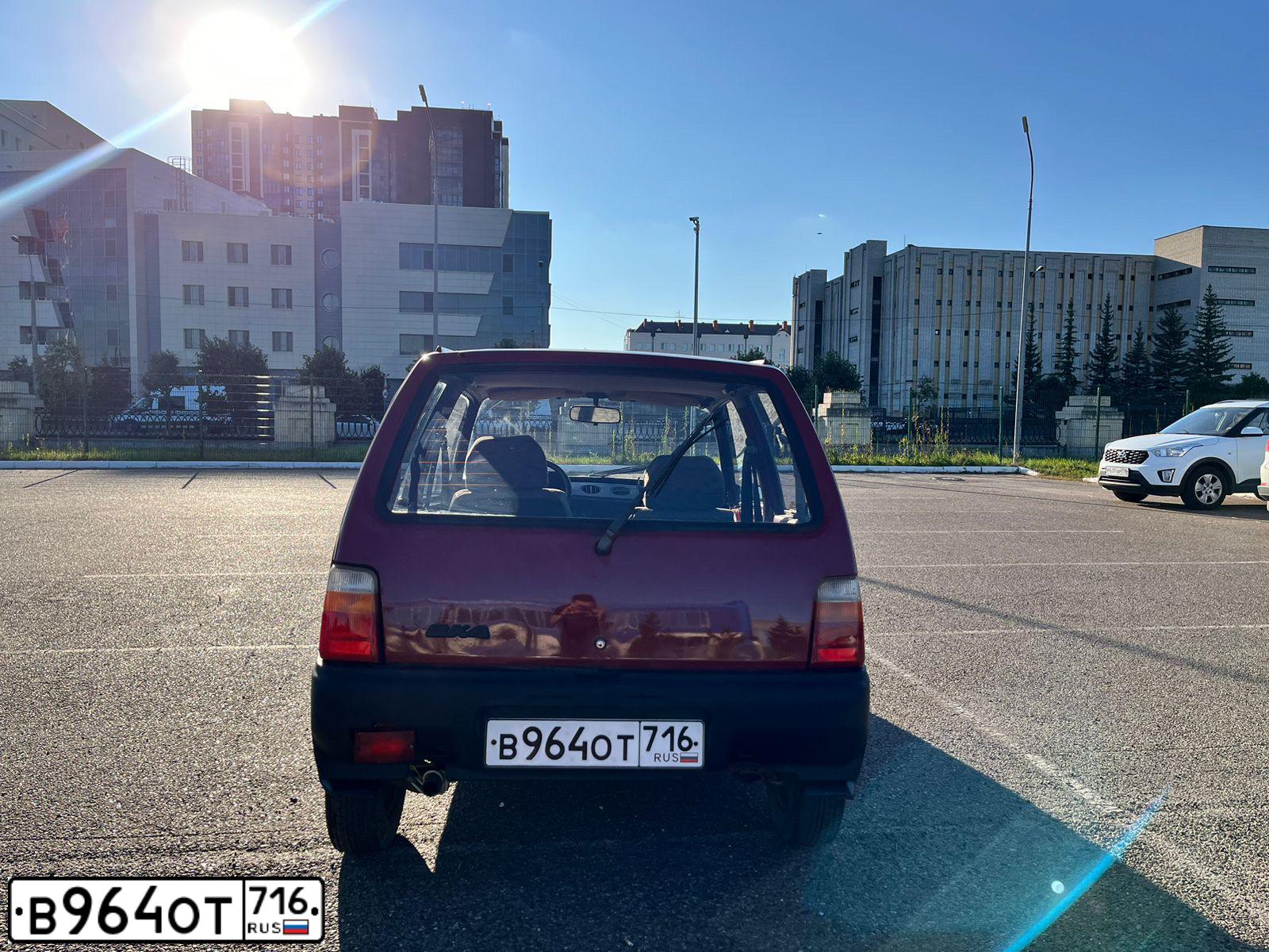 Фото автомобиля SEAZ OKA, 2003 — госномер Е338ВС116. Цвет: ВИШНЕВЫЙ